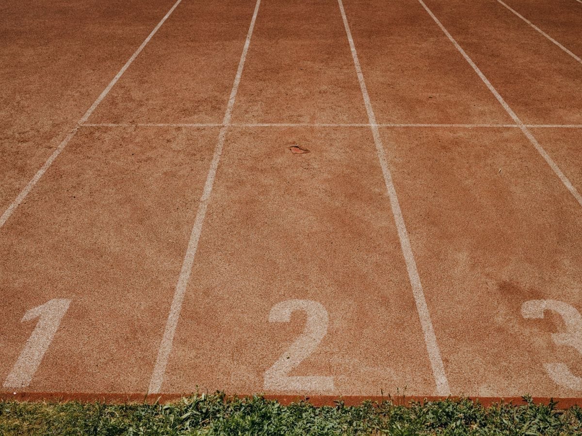 Numbered lanes marked on a running track